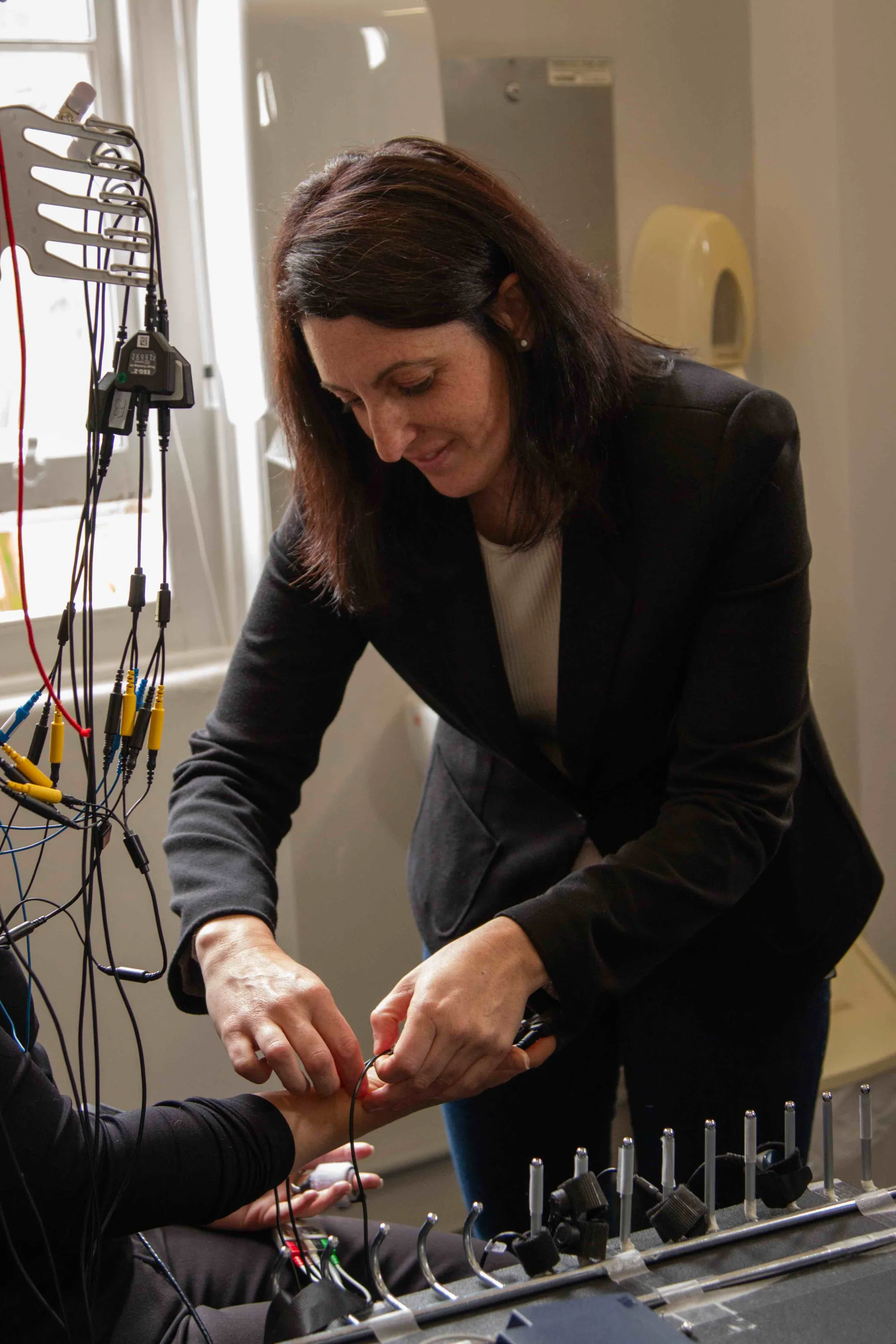 Ilaria Pozzato adjusting a monitor